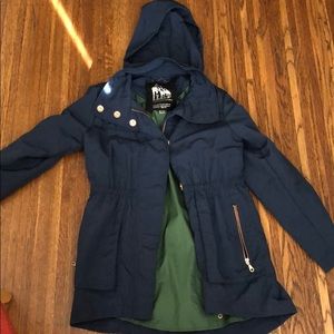 Awesome rain jacket with rose gold details